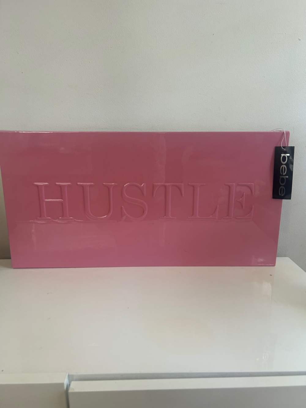 NWT bebe- Pink Embossed "HUSTLE" Wall Art 24”x12”